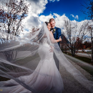 Bride and Groom dramatic photo at the grounds of Aga Khan Museum